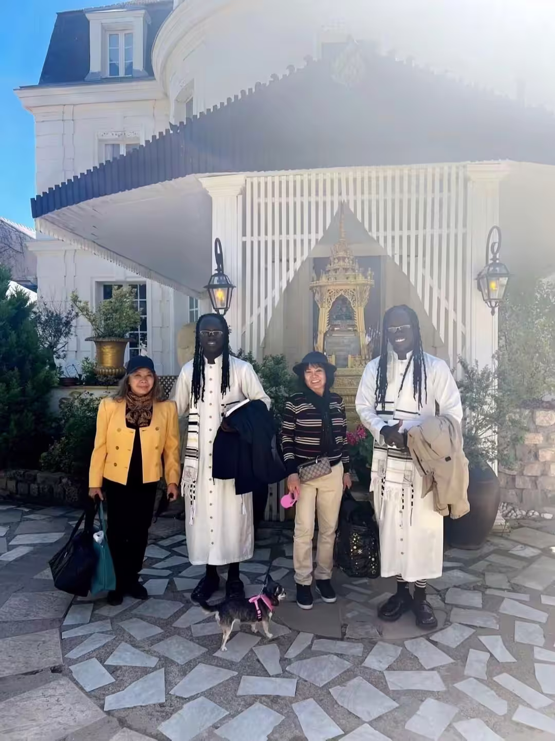 Mystic Twins traveling abroad in traditional dress