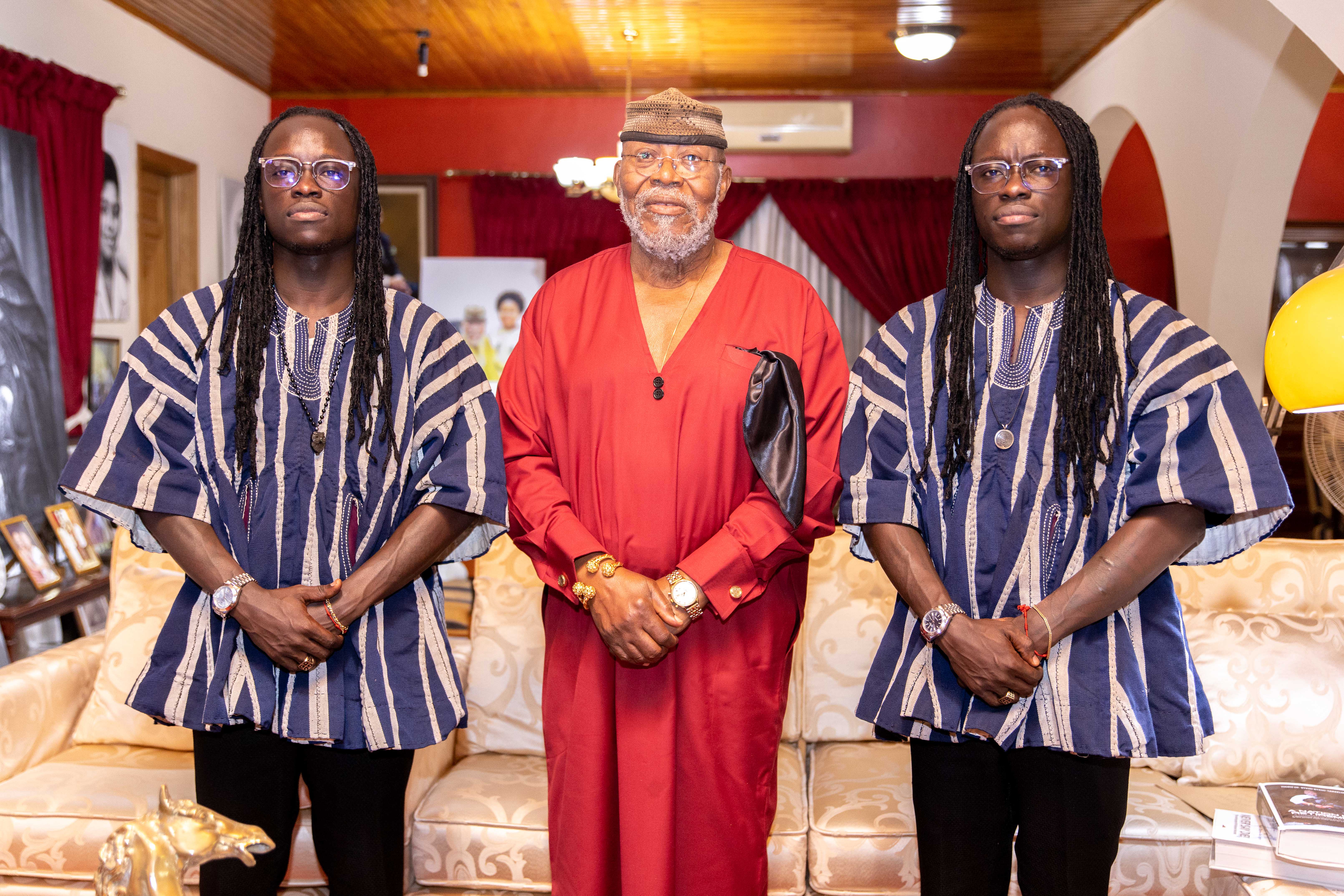 The Mystic Twins with an elder at home