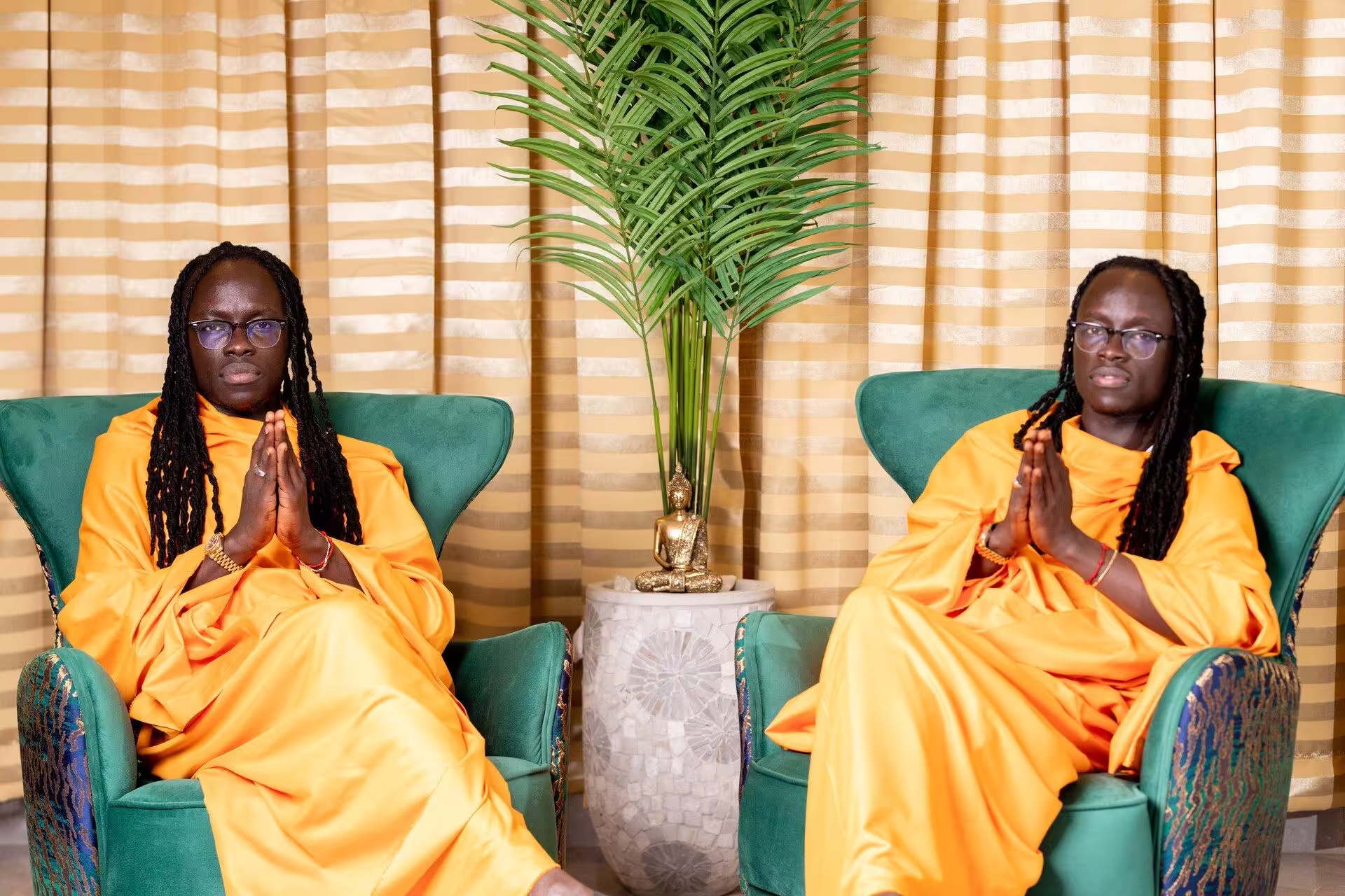 The Mystic Twins in traditional attire